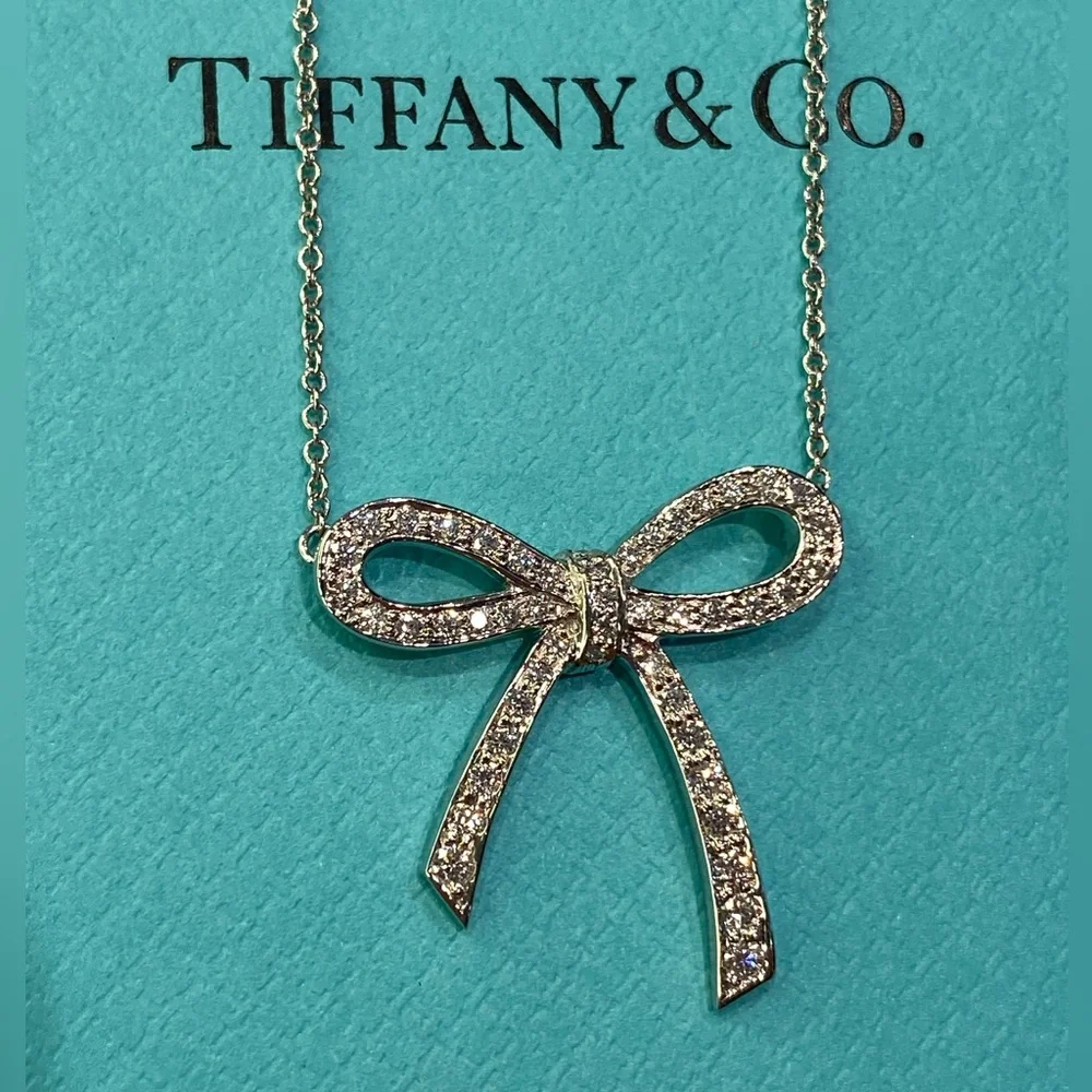 Tiffany & Co. Platinum 0.27ctw Diamond Bow Pendant Necklace
